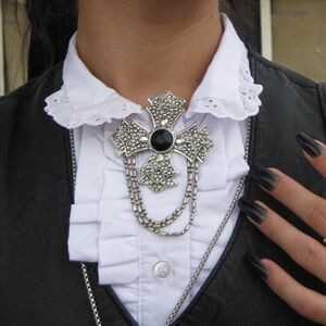 Cross brooch